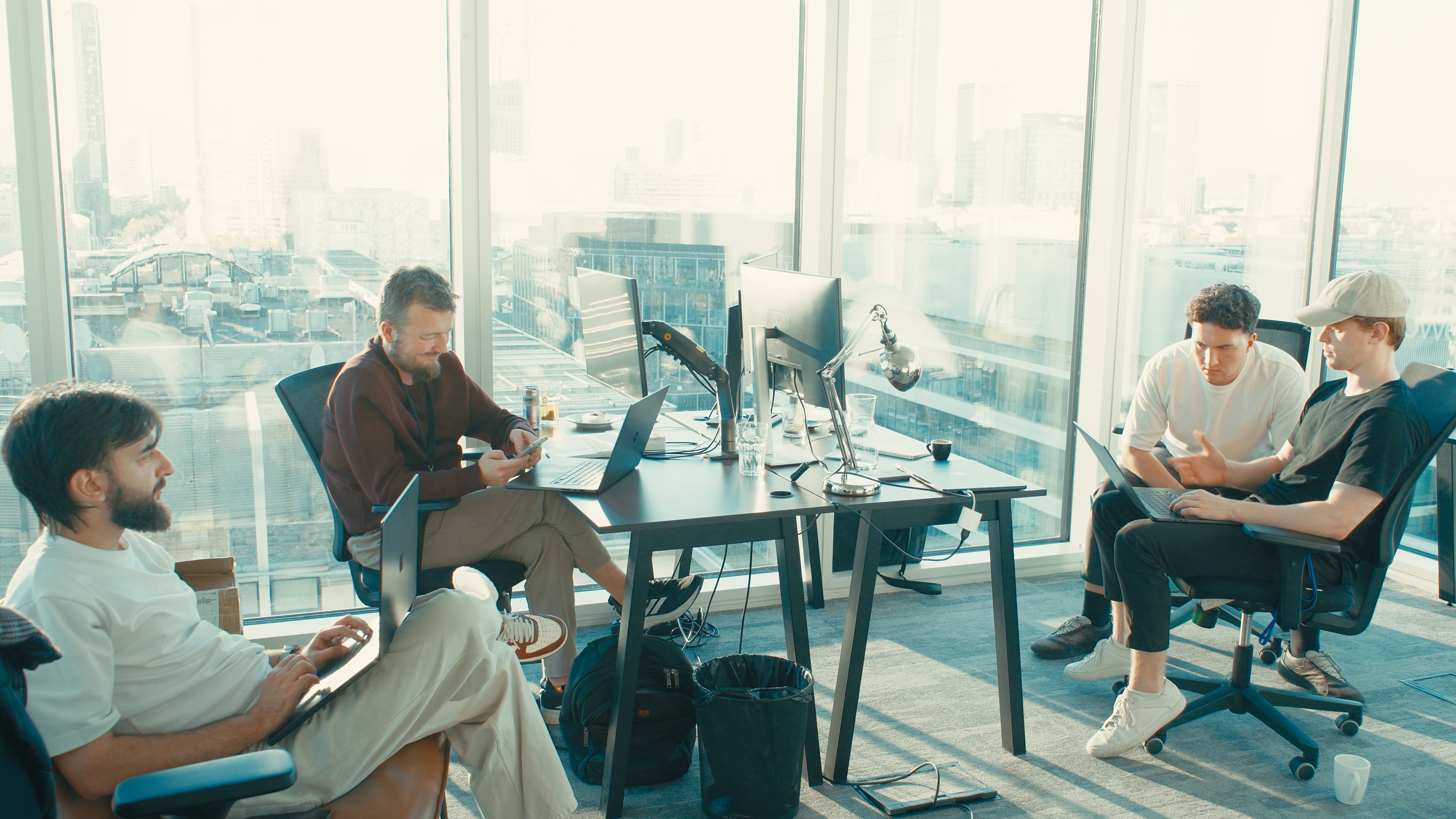 The Boski team working together in a sunlit office.